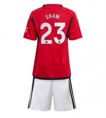 Manchester United Luke Shaw #23 Koti Pelipaita Lasten 2023-24 Lyhyet Hihat (+ Lyhyet housut)